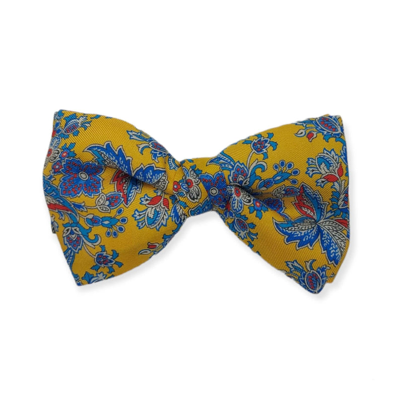 Set : Silk suspenders in mustard background and multicolors flowers in red and blue tones with matching bow tie.. Finished with black leather and with matching bow tie.